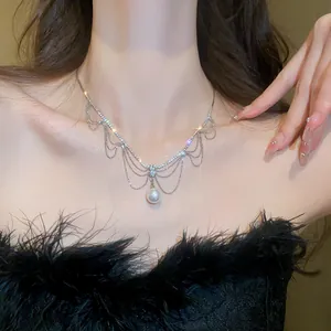 Elegant French style rhinestone pearl pendant necklace shown on model's neck detail