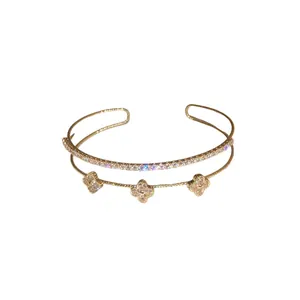 Elegant double-layered gold flower cuff bracelet with sparkling cubic zircon stones