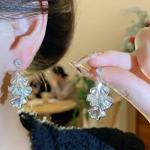 Elegant silver plated pleated leaf dangle earrings with sparkling crystal rhinestone stud