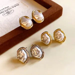 French vintage irregular baroque pearl stud earrings with gold and silver wrinkled borders