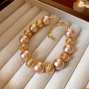 Vintage French style adjustable pearl bracelet with elegant gold hollow beads for women
