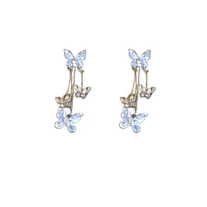 Elegant long dangling butterfly earrings with sparkling blue crystals and silver pins