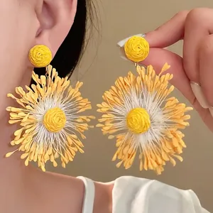 Elegant handmade woven yellow flower drop earrings for bohemian vacation style accessories
