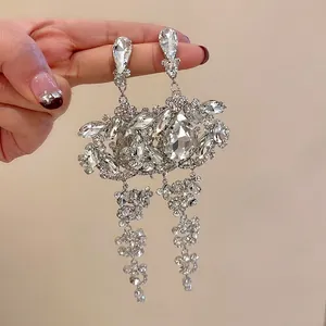 Exquisite silver needle chandelier earrings with cascading teardrop crystal tassels for formal dress