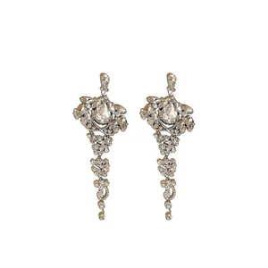 Elegant crystal water-drop tassel earrings with shimmering rhinestones for formal occasions.