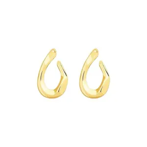 Elegant gold-tone twisted metal earrings featuring a unique abstract minimalist design