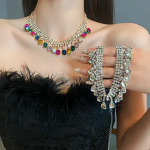 Detail view of colorful and clear geometric rhinestone choker necklaces on model