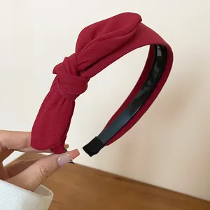 Diadema vintage roja con lazo anudado, accesorio para el cabello de mujer invierno