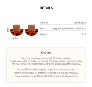 Detail view of wood and resin earrings with size and material specifications in English text.