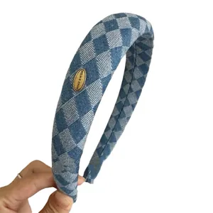 Korean style retro blue and white checkered padded headband with a small gold metal tag