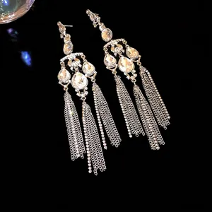 Elegant silver needle earrings with oversized rhinestone teardrop tassels for party