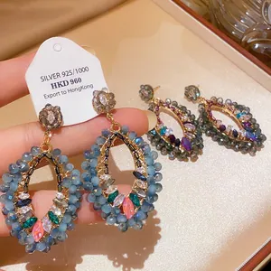 Vintage court style teardrop earrings with light blue beads and colorful marquise crystals