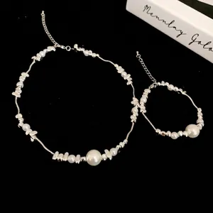 Minimalist titanium steel necklace and bracelet set with white pearls and silver beads