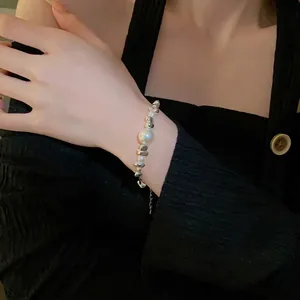 Minimalist titanium steel nugget and pearl bead bracelet for women in a chic cold style
