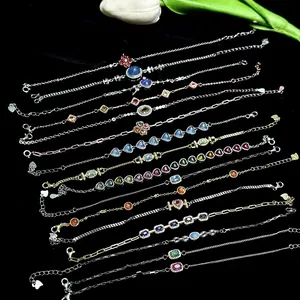 Elegant collection of zircon charm bracelets featuring heart and clover motifs