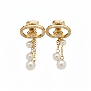 Elegant 18k gold plated oval clip earrings with dangling pearls and zircon accents