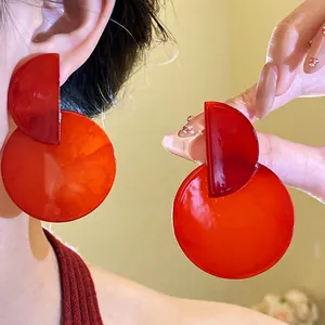 Elegant vintage red marbled resin asymmetric circular drop earrings for a chic look