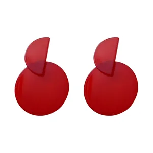 Retro red asymmetric round drop earrings featuring a minimalist and elegant aesthetic style.