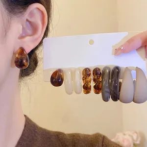 Elegant retro acrylic marble pattern hoop earring set in warm brown and beige tones