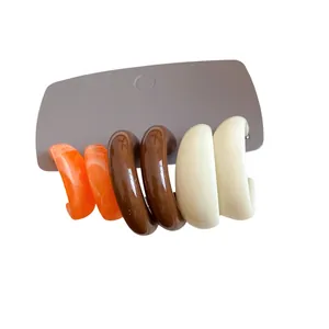 Stylish acrylic C-shaped hoop earring set in vintage marble orange and solid tones