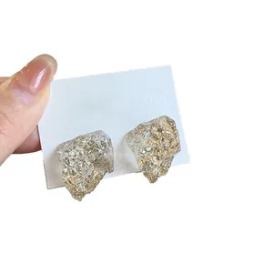 Minimalist handcrafted irregular resin stud earrings with gold foil inclusions