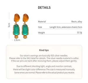 Detailed view of irregular oval resin earrings with size and weight specifications