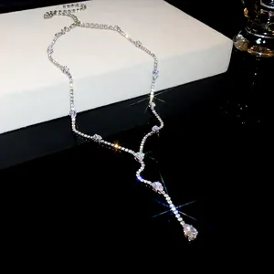 Elegant Y-shaped lariat necklace with sparkling drop-cut cubic zirconia and tassel detail.