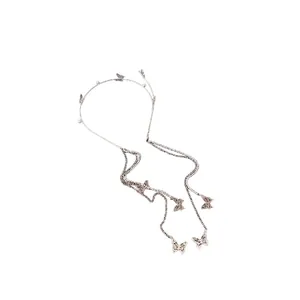 Exquisite silver headband featuring rhinestone butterflies, pearls, and elegant long tassels