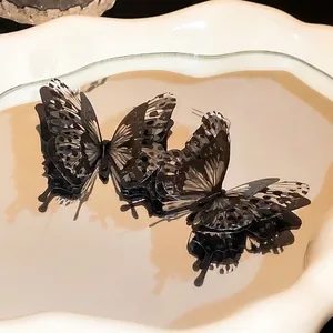 Stylish 3D black butterfly ear hooks with leopard wing pattern for women