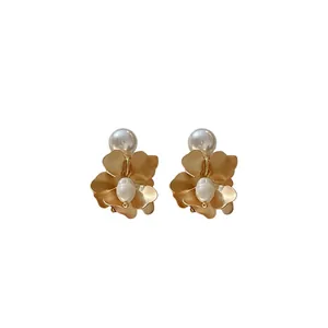 French retro gold flower earrings with freshwater pearls, elegant minimalist design for women
