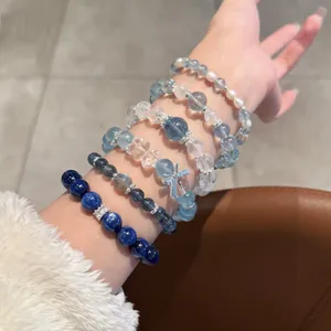 Elegante set di braccialetti di perline in stile cinese con occhio di tigre e pietre blu.