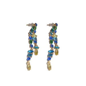 Elegant gold tassel earrings featuring multi-colored oval and marquise zircon stones