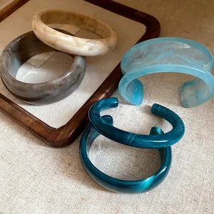 Elegant vintage marbled acrylic bangles and cuffs set with artistic swirled patterns