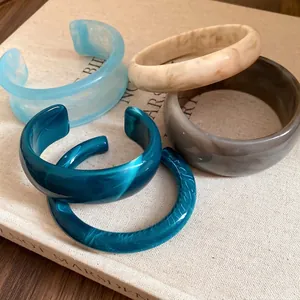 Vintage acrylic marbled open cuffs and bangles set in various colors for elegant women