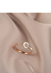 Detailed close-up view of a rose gold ring featuring shell inlay and Love Forever engraving