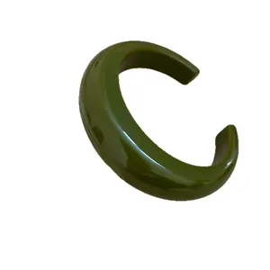 Chic vintage olive green resin cuff bangle bracelet featuring a smooth glossy finish
