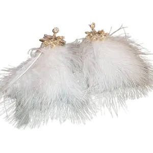 Elegant bohemian feather tassel earrings with sparkling crystal flower studs for women