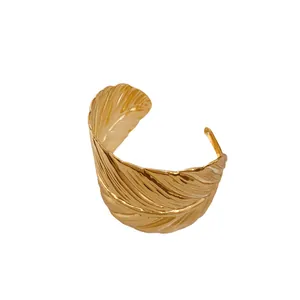 Elegant luxury gold leaf texture open cuff bracelet with detailed metal engraving for women
