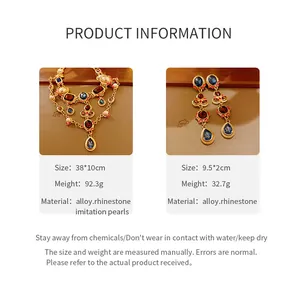 Vintage style jewelry set featuring rhinestone necklace and matching teardrop earrings