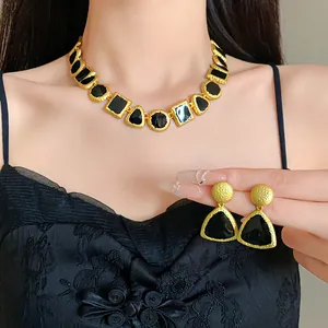 Vintage geometric black enamel necklace and matching earring set with gold textured finish