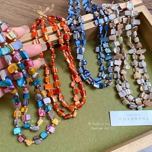 Vintage Bohemian double-layer necklace featuring irregular colorful natural shell beads