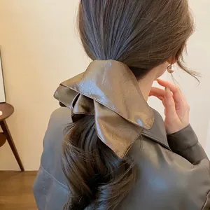 Retro Korean style brown leather bow scrunchie for ponytail hair accessories