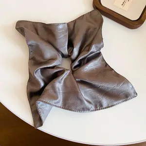Retro faux leather square hair scrunchie featuring elegant pleats and premium texture