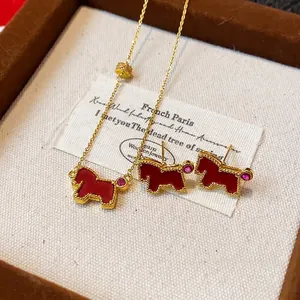 Elegant red zircon horse jewelry set with necklace and earrings in golden finish