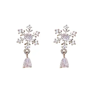 Elegant snowflake stud earrings with pear-shaped crystal drop on white background
