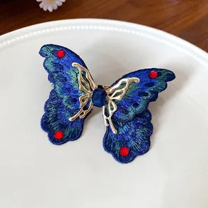 Anello a farfalla ricamato a mano con cristallo blu e strass scintillanti, stile coreano.
