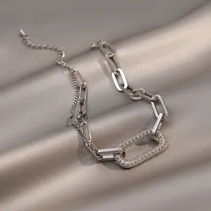 Detailed macro shot of vintage silver geometric chain bracelet with sparkling pavé link