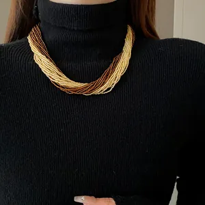 Bohemian multi-layer seed bead necklace in gold and brown tones