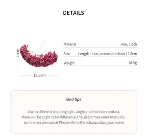 Detail view of purple cloth flower hair pin with dimensions, material, and weight info