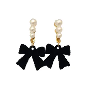 Elegant French style black velvet bow earrings with three vertical white pearls